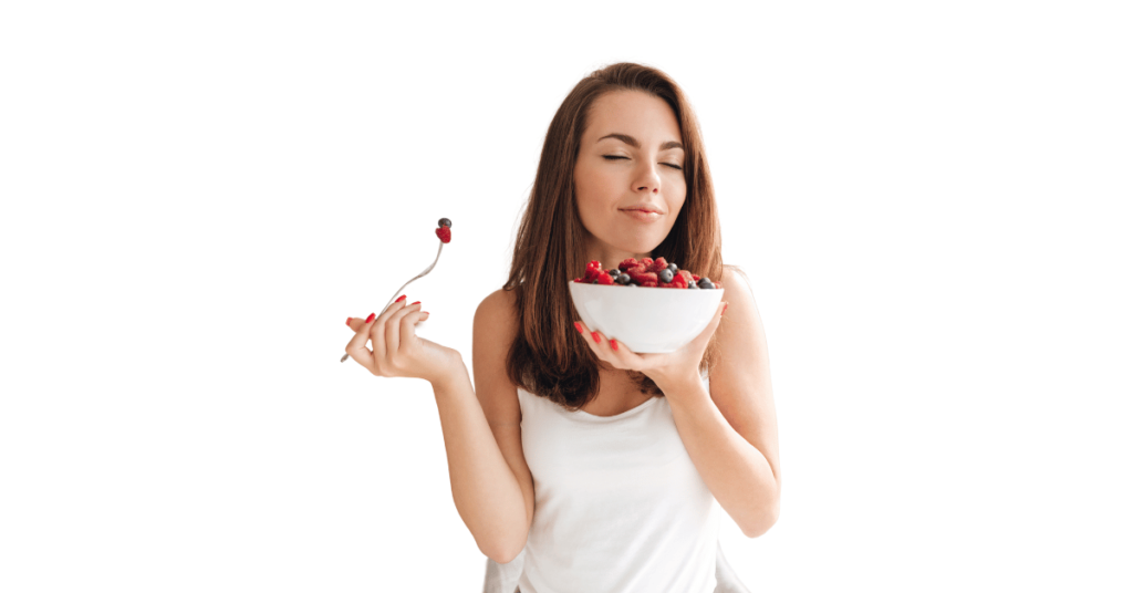 A person eating blueberries for weight loss.