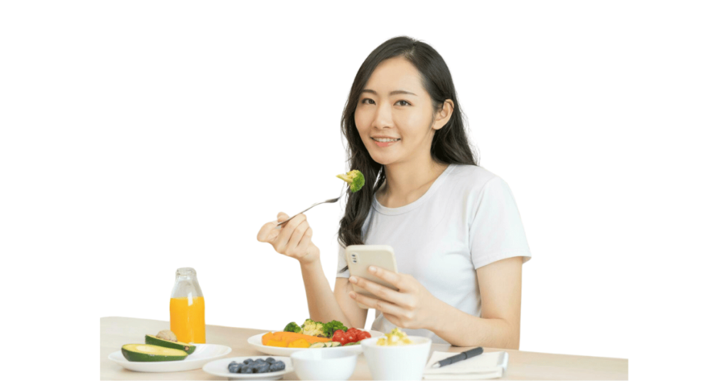 A person eating broccoli for weight loss.