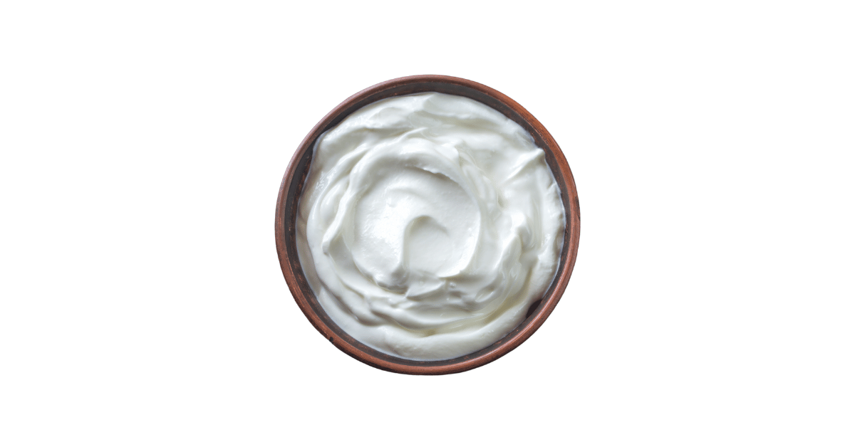 A close-up picture of greek yogurt related to greek yogurt nutrition facts, in white background.