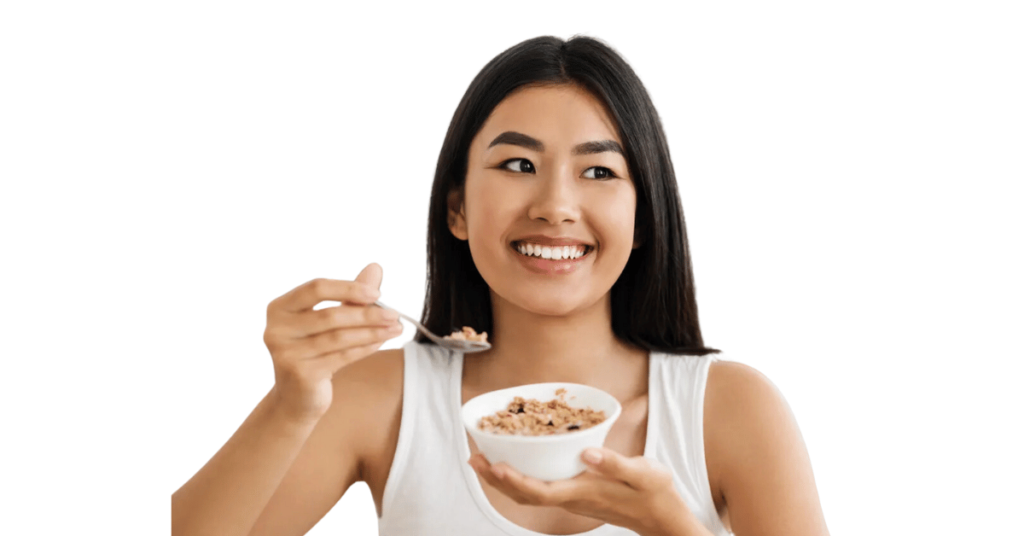 A person eating oats for weight loss.