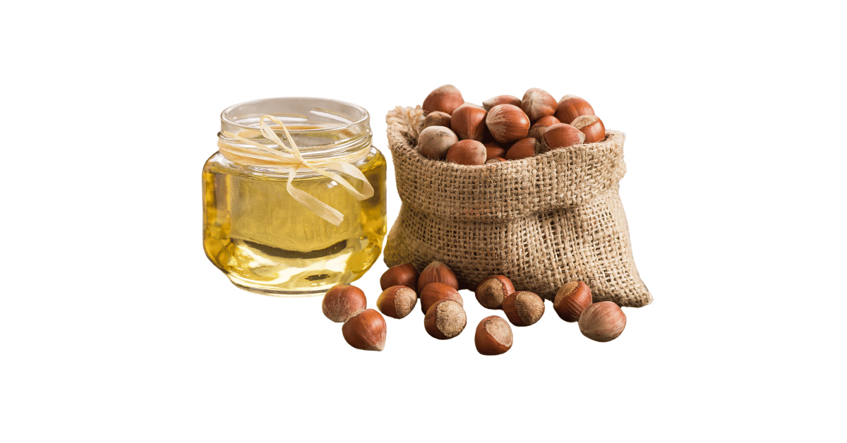 A close-up picture of hazelnut oil related to hazelnut oil nutrition facts, in white background.