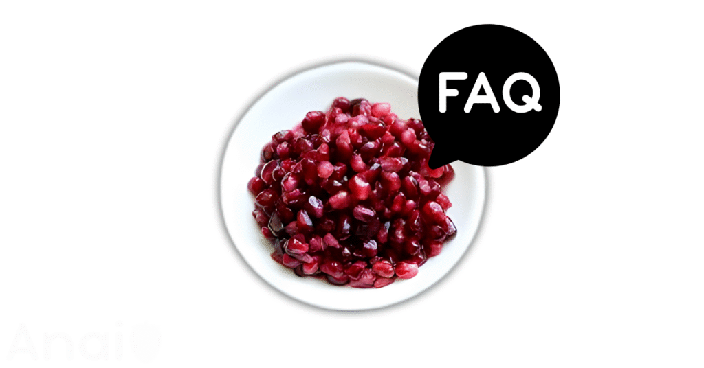 A pic of fresh pomegranate seeds next to a black banner for pomegranate seeds nutrition FAQs.
